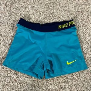 Teal Nike pro shorts- size M